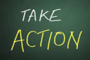 Take Action Words On Chalkboard Background